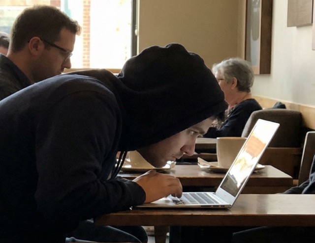 Person with poor posture while working remotely 2